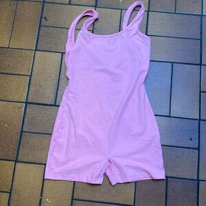 pink body suit